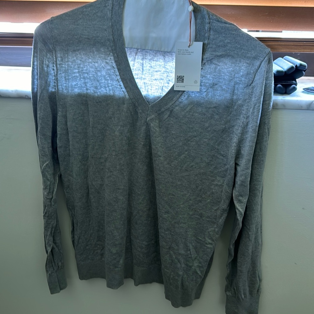 Soft and comfortable black-grey long sleeve top, XL. V neck. Runs small. NWT.